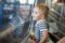 Young happy boy on train